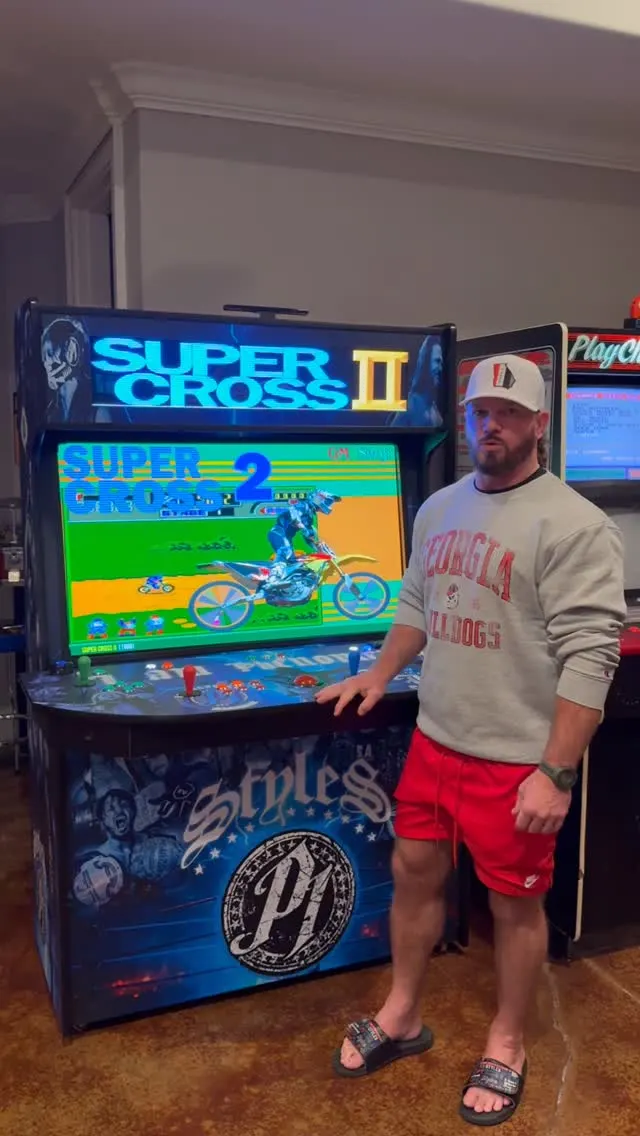 AJ Styles with the Phenomenal Arcade