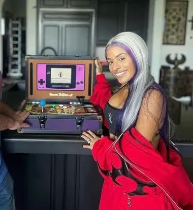 Zelina Vega with the Zelina Vega arcade